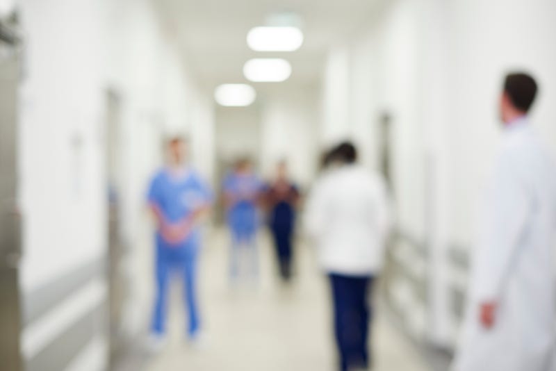 Blurred hospital hallway stock photo. 
