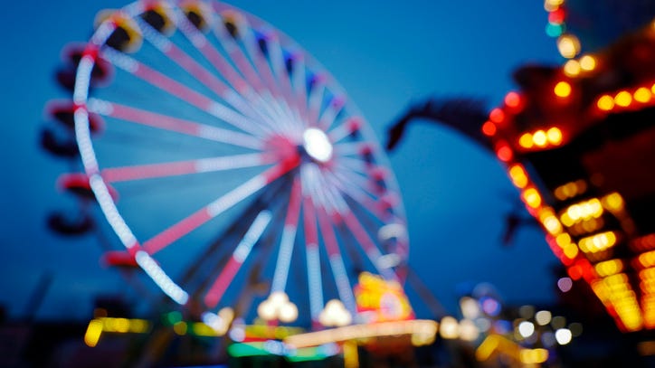 VIDEO: People rush to stop carnival ride from tipping over at Michigan festival