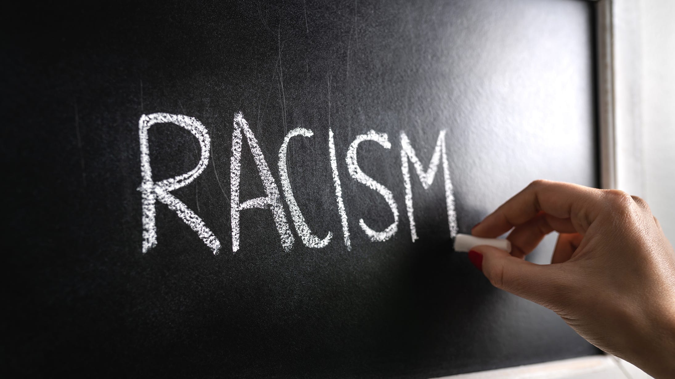 Texas teacher tells class he's racist
