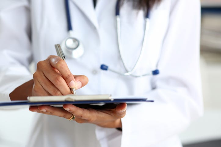doctor with clipboard