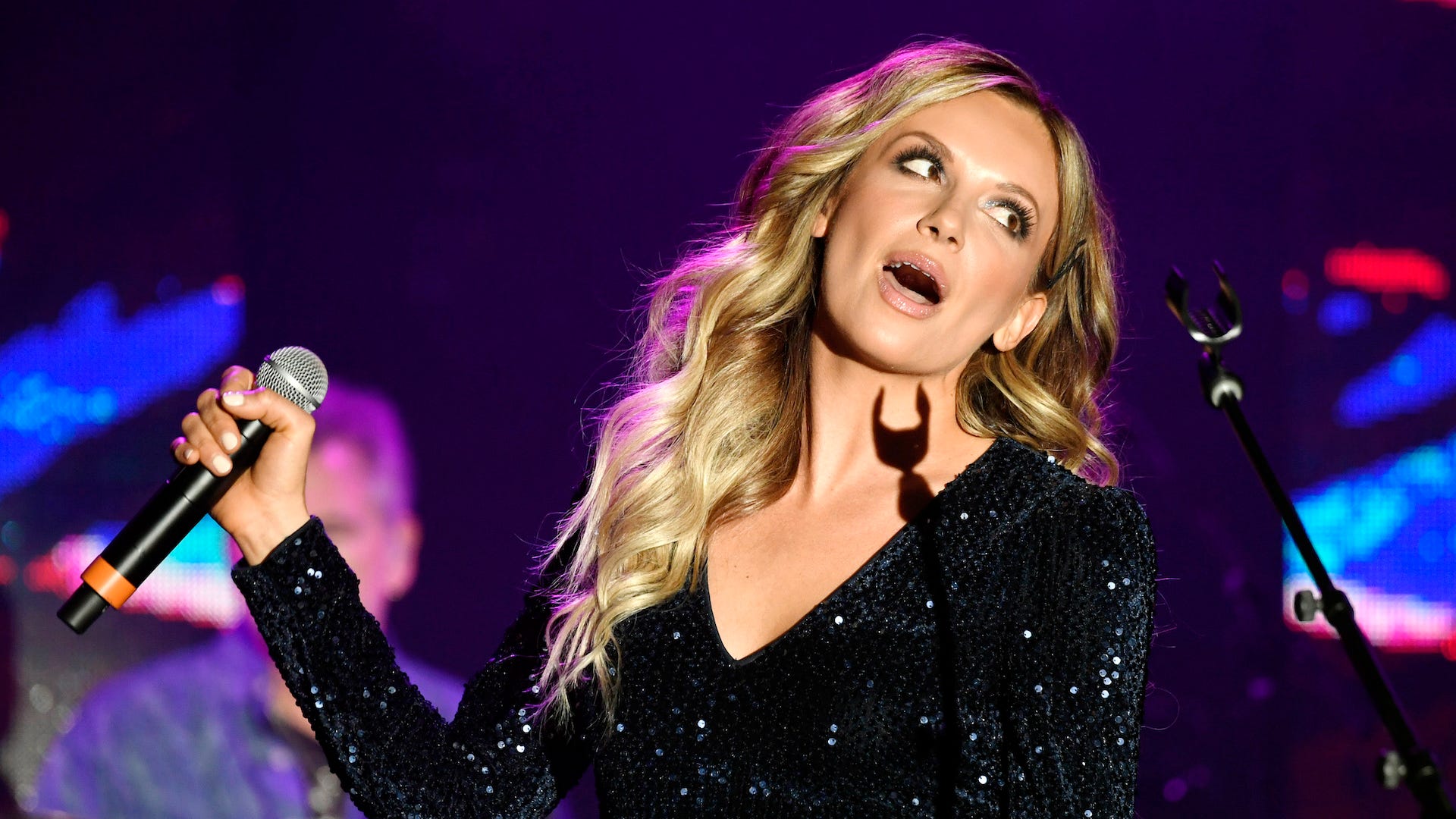 Watch Dolly Parton surprise Carly Pearce with a Grand Ole Opry invite
