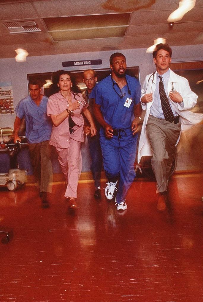 The cast of "E.R." in 1997: (left to right) George Clooney, Julianna Margulies, Anthony Edwards, Eriq La Salle and Noah Wyle