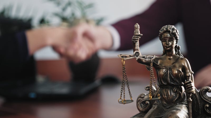 Handshake in a lawyer's office