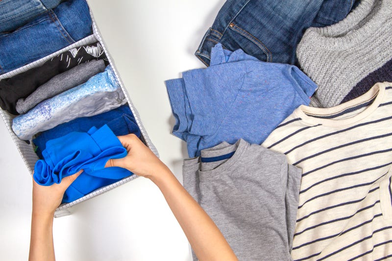 Vertical storage of clothing, tidying up, room cleaning concept