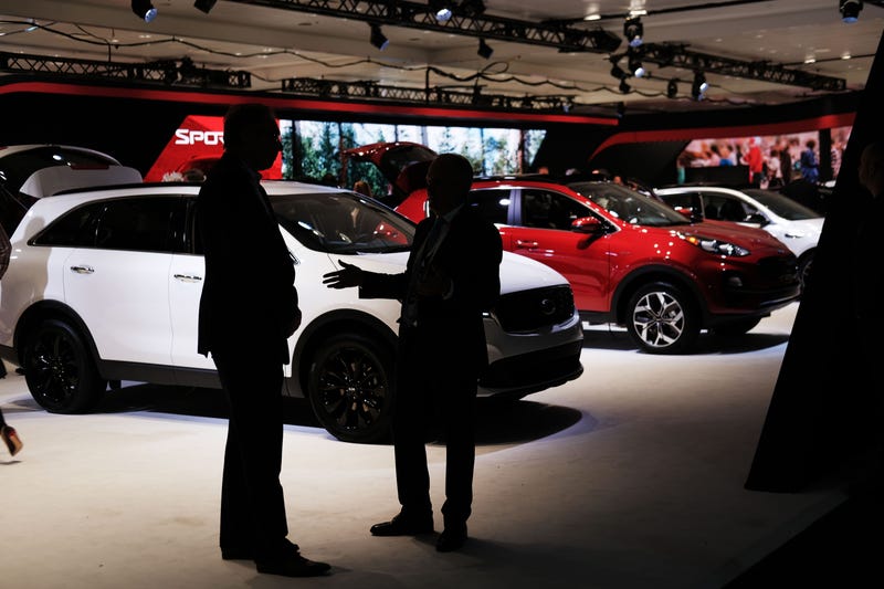 People walk through the New York International Auto Show at the Jacob K. Javits Convention Center on April 17, 2019 in New York City.