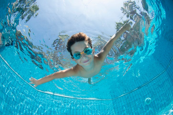 Boy in swimming pool