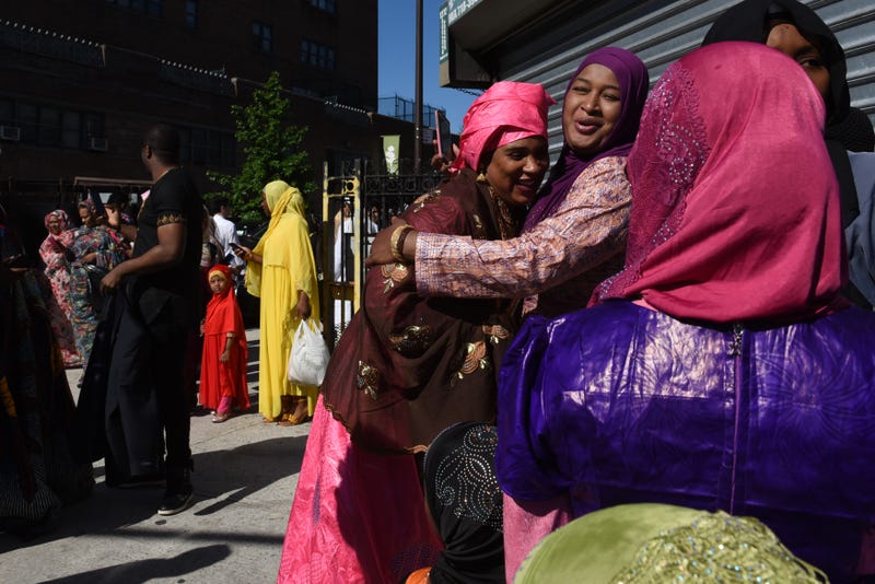 People celebrate at a mosque called the Masjid at-Taqwa after the Eid al-Fitr prayer on June 4, 2019 in the Brooklyn borough of New York City. The day of Eid al-Fitr marks the end of the Muslim holy month of Ramadan.