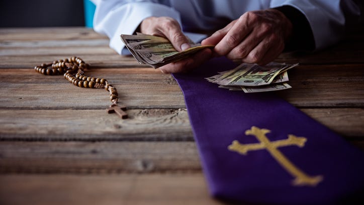 Priest stands accused of embezzling over $800K, faces criminal charges