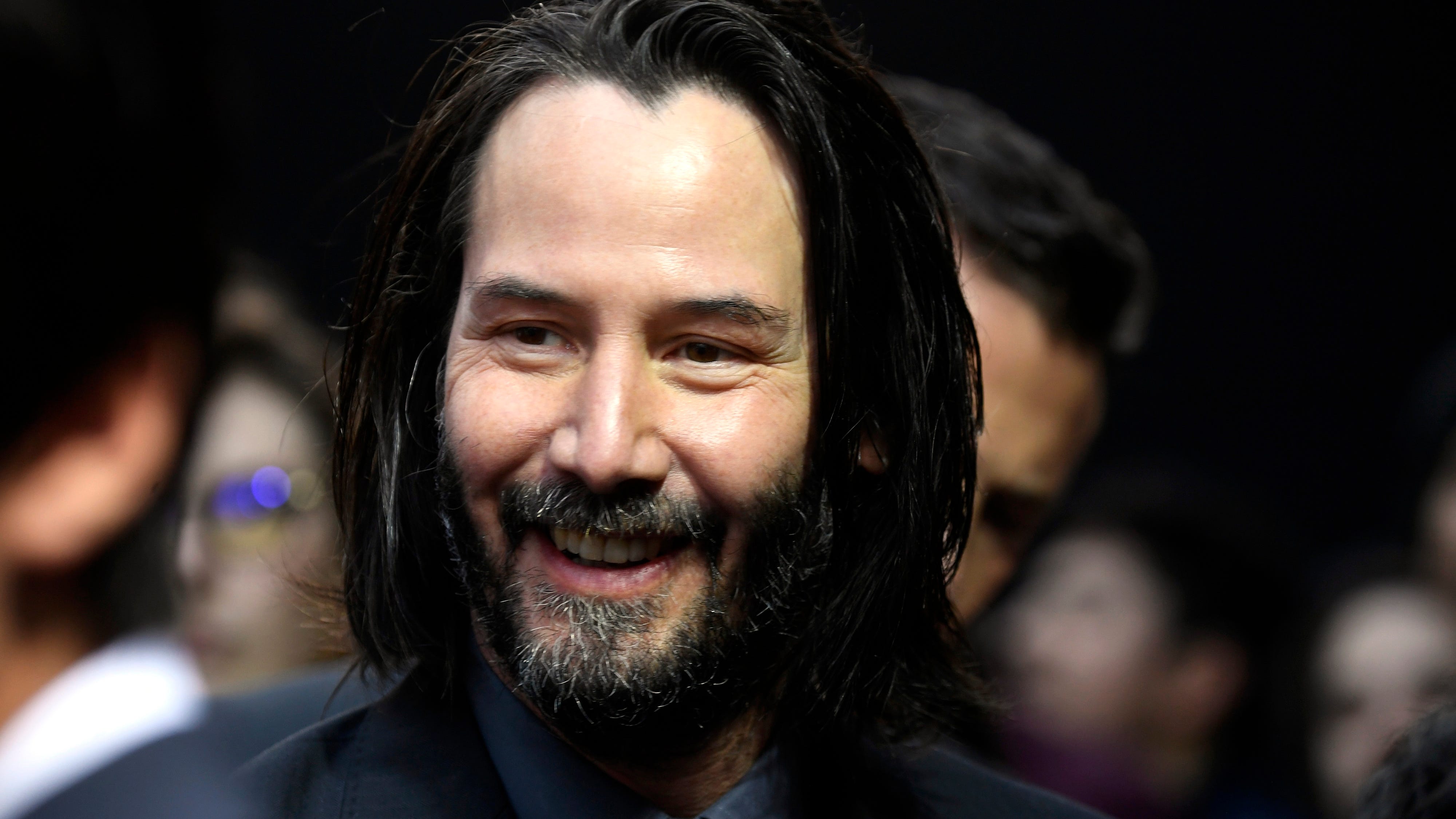 Keanu Reeves goes viral after he was spotted interacting with young fan at airport