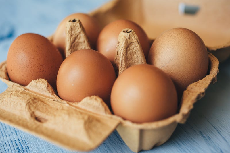 Brown eggs in an egg carton