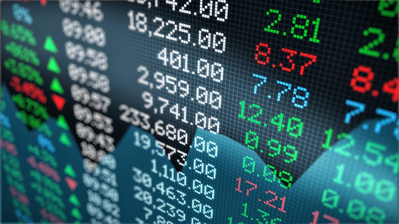 Close-up view of a stock market data board.