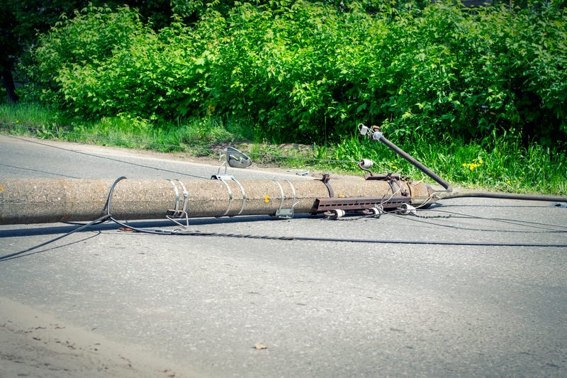 File Photo: Downed utility pole