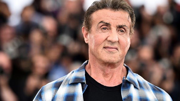 Sylvester Stallone, 74, shows off massive bicep in workout photo: 'Doing some old school action'