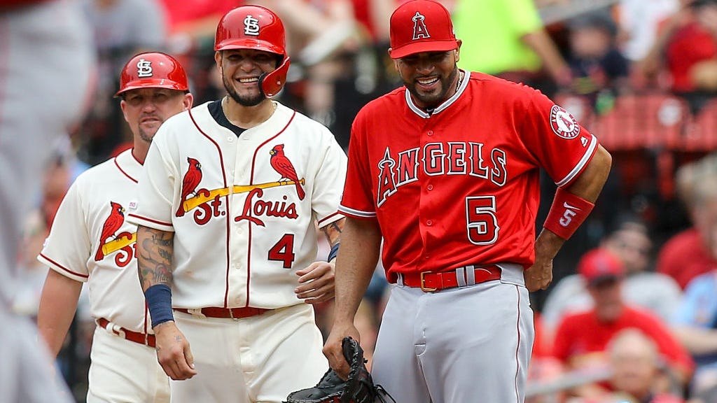 'It's not even close': Pujols says Yadi is the greatest catcher of his time