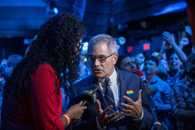  Philadelphia District Attorney Larry Krasner speaks to a reporter at of the election party of public defender Tiffany Caban moments before she claimed victory in the in the Queens District Attorney Democratic Primary election, June 25, 2019 in the Queens borough of New York City. 