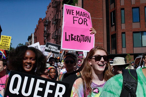 Activists shout slogans at police during the Queer Liberation March on June 30, 2019 in New York City. The march marks the 50th anniversary of the Stonewall riots in the Greenwich Village neighborhood of Manhattan on June 28, 1969, widely considered a watershed moment in the modern gay-rights movement. The Queer Liberation March, organized by the Reclaim Pride Coalition, began as a protest of the much larger NYC Pride March, which some have accused of being too corporate-sponsored and too strict on participation requirements.