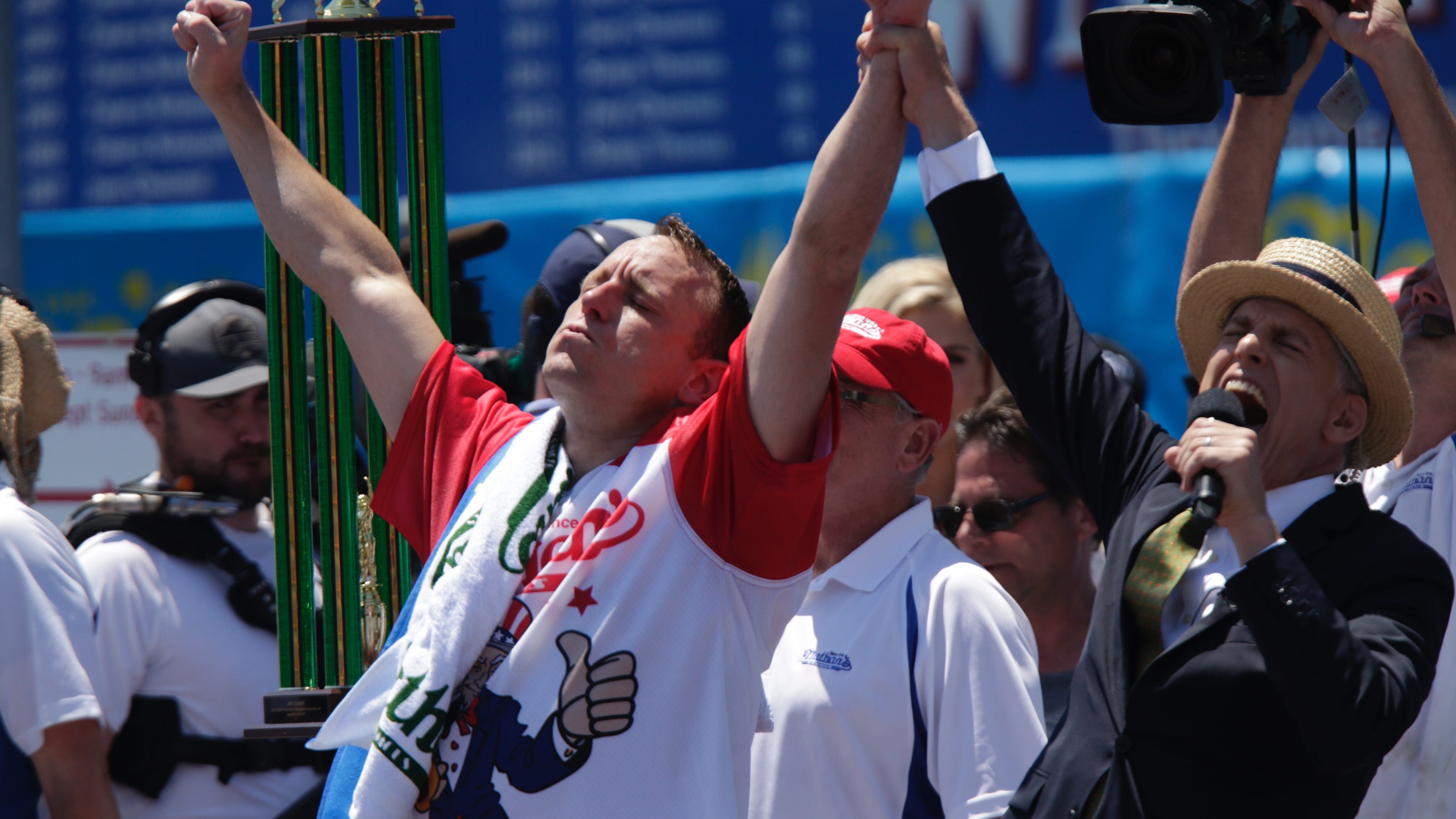 13-Time Nathan’s Champ Joey Chestnut Eats Record 75 Hot Dogs in 10 Minutes