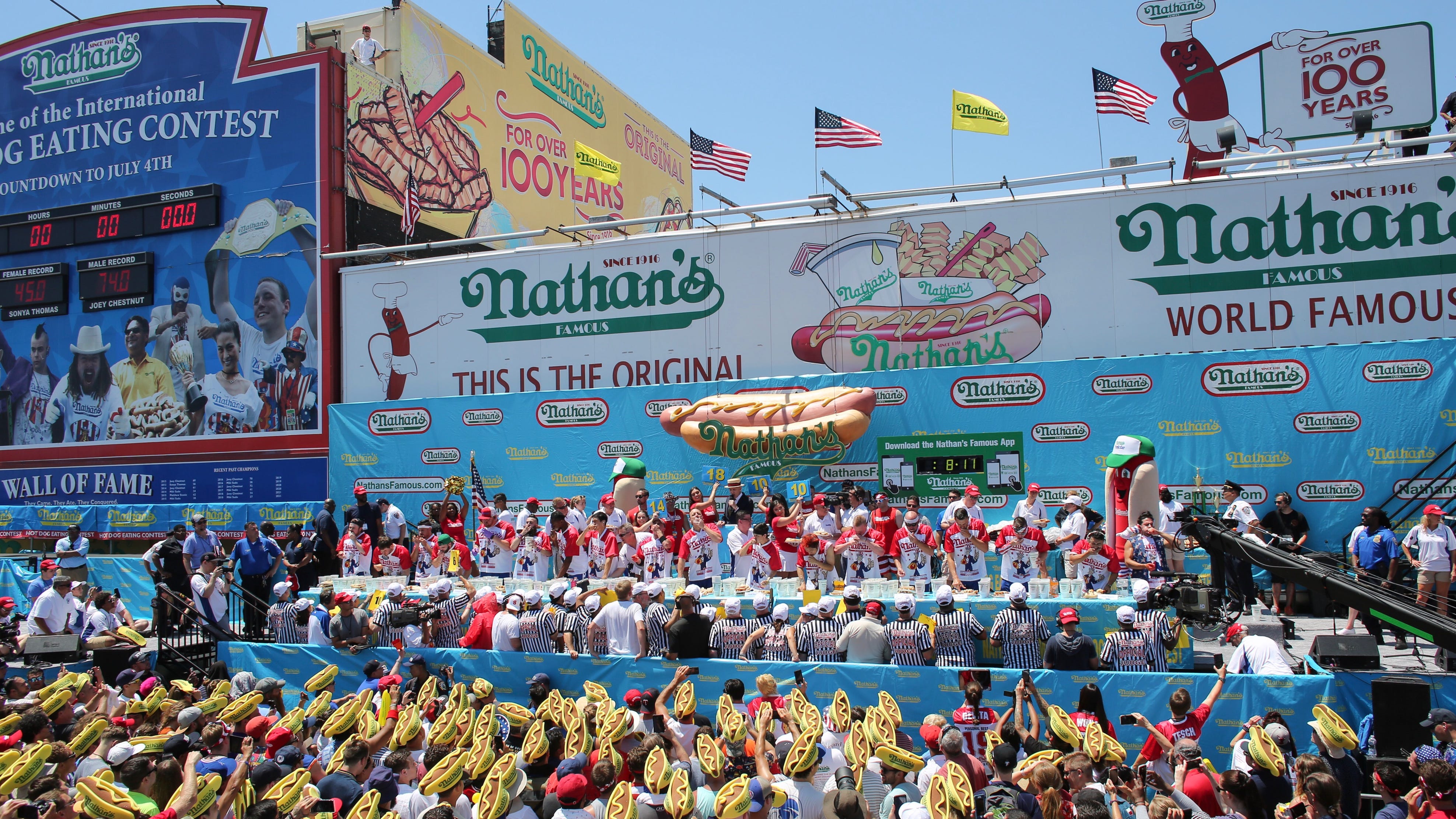 Nathan's hot dog eating contest will be back before a crowd on July 4