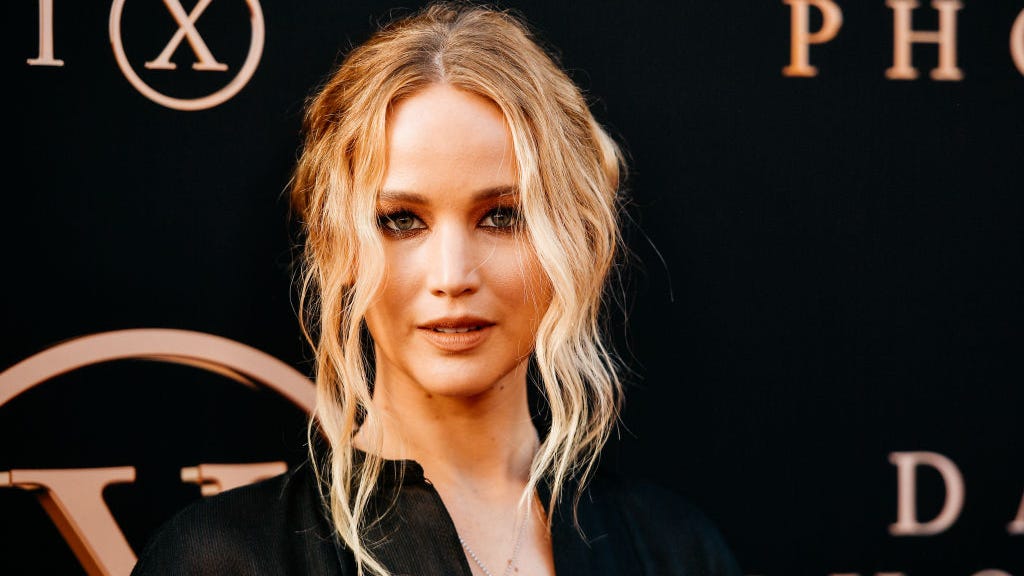 Jennifer Lawrence 'accidentally inhaled' a fake nose ring 'many, many times' and had to spit it out in front of Leonardo DiCaprio