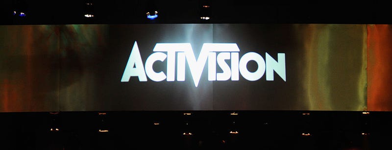 Gamers and show attendees wlak out of the Activision booth after a attending "Call of Duty 3" video game trailer during the Electronic Entertainment Expo on June 7, 2011 in Los Angeles, California. 