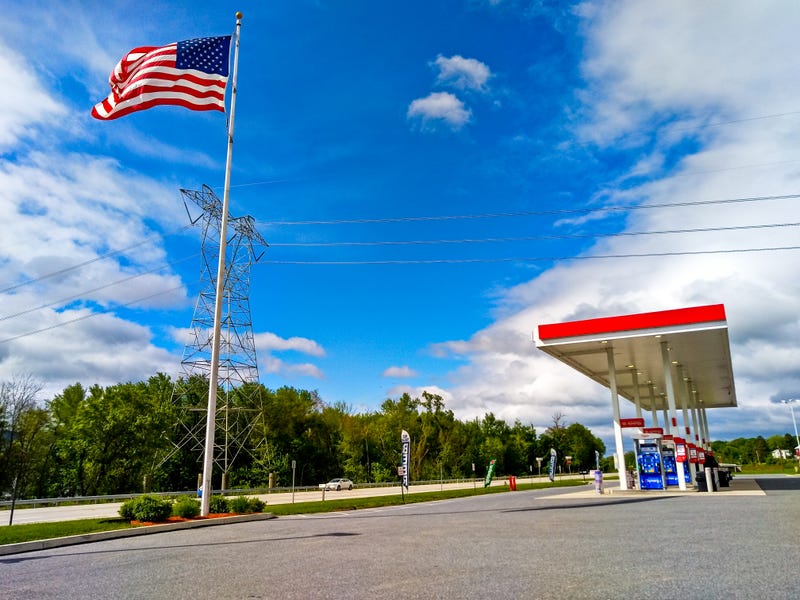 American flag at a gas station