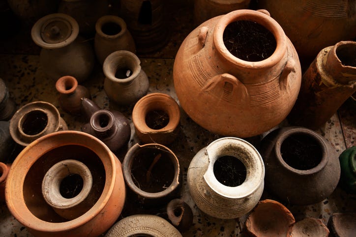 Several older jars and pots. 