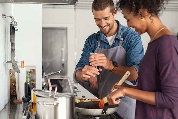 Couple cooking together