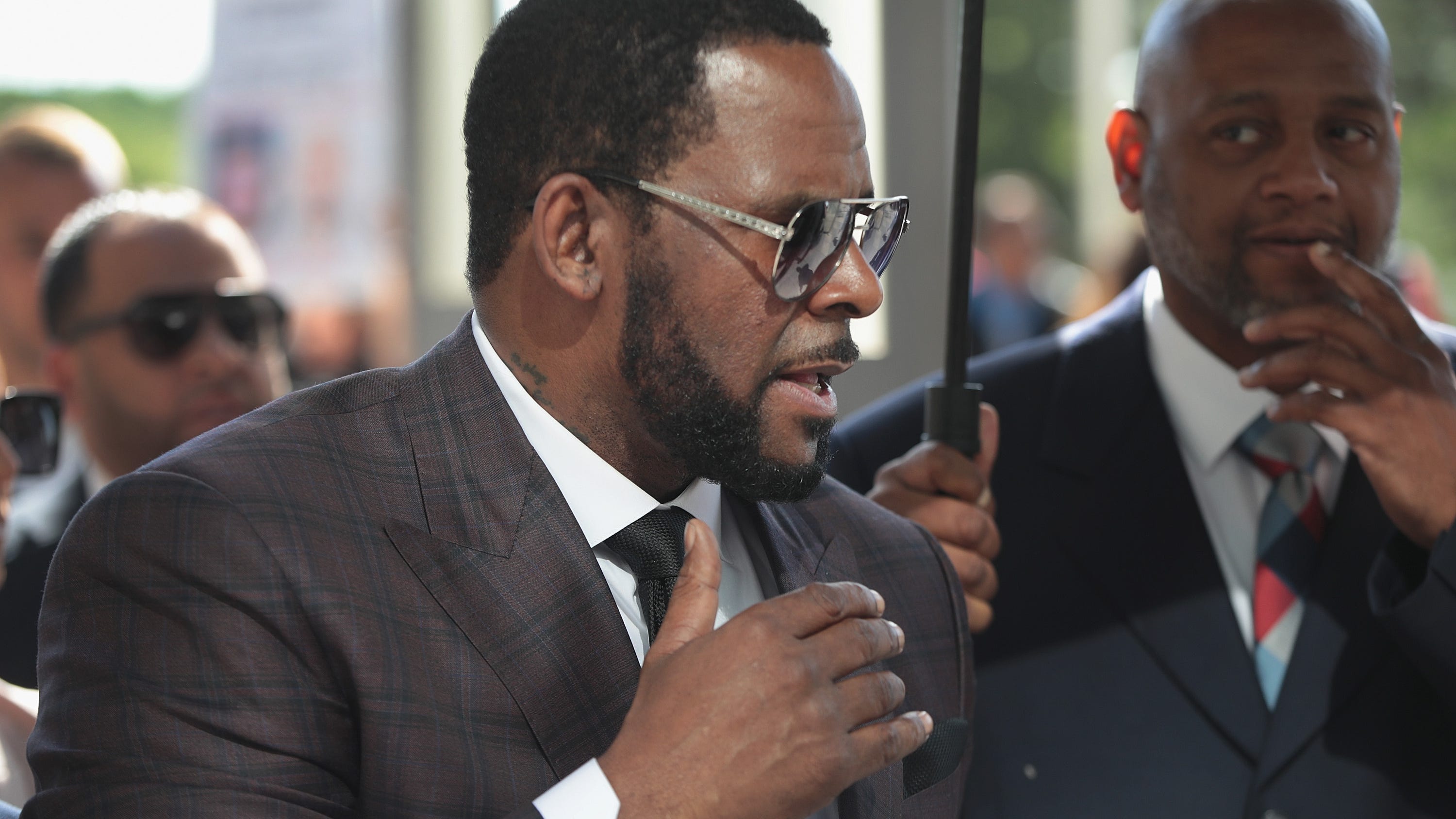 Feud erupts between lawyers for R. Kelly and his former employee Derrel McDavid