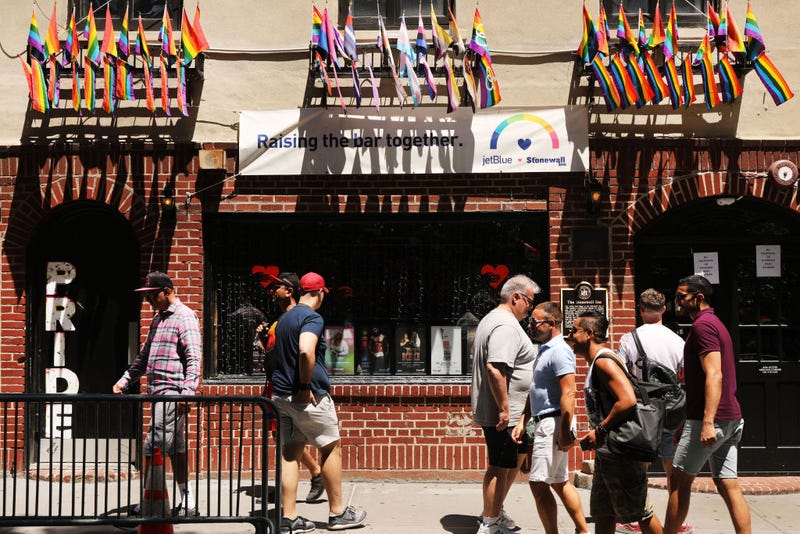 A crowd gathers outside the Stonewall Inn as New York City celebrates Pride Month on June 26, 2019 in New York City.