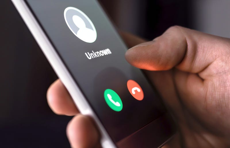 An unknown call coming on a cell phone.