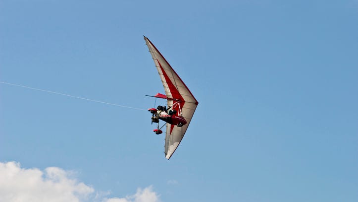 Small glider airplane crashes into Lyon Township pond