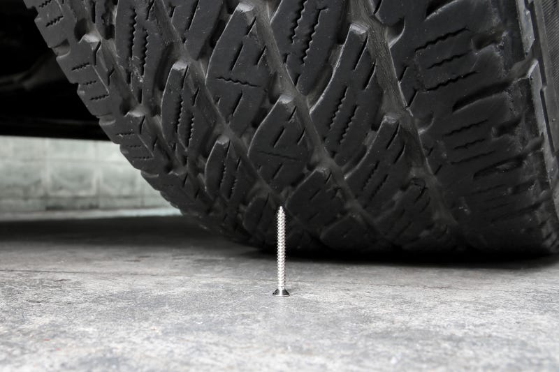 Screw trap was placed under the car tire