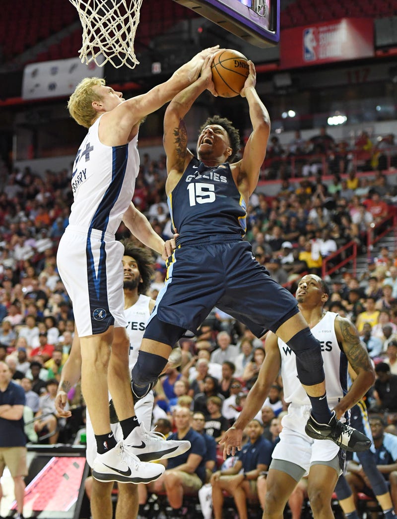 Canyon Barry #24 of the Minnesota Timberwolves blocks a shot by Brandon Clarke #15 of the Memphis Grizzlies during the championship game of the 2019 NBA Summer League at the Thomas & Mack Center on July 15, 2019 in Las Vegas, Nevada.