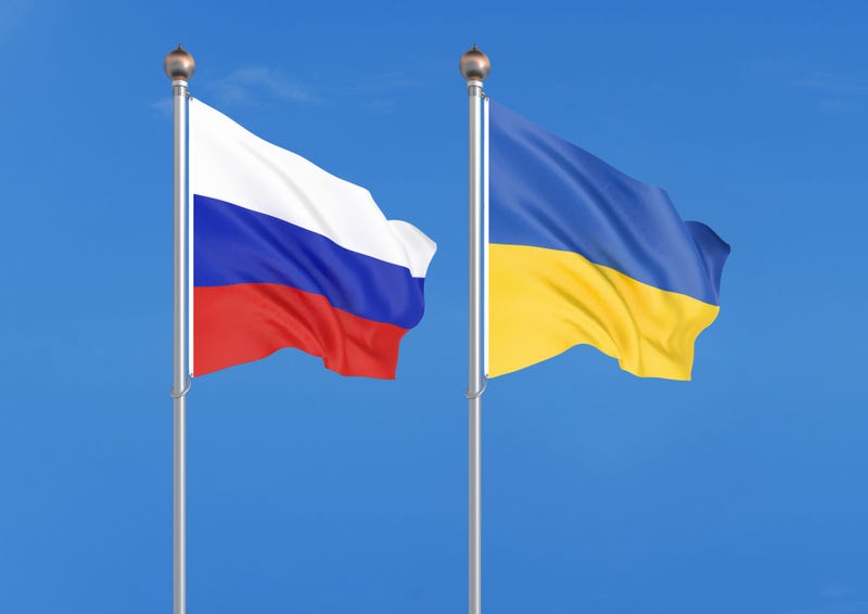 Thick colored silky flags of Russia and Ukraine