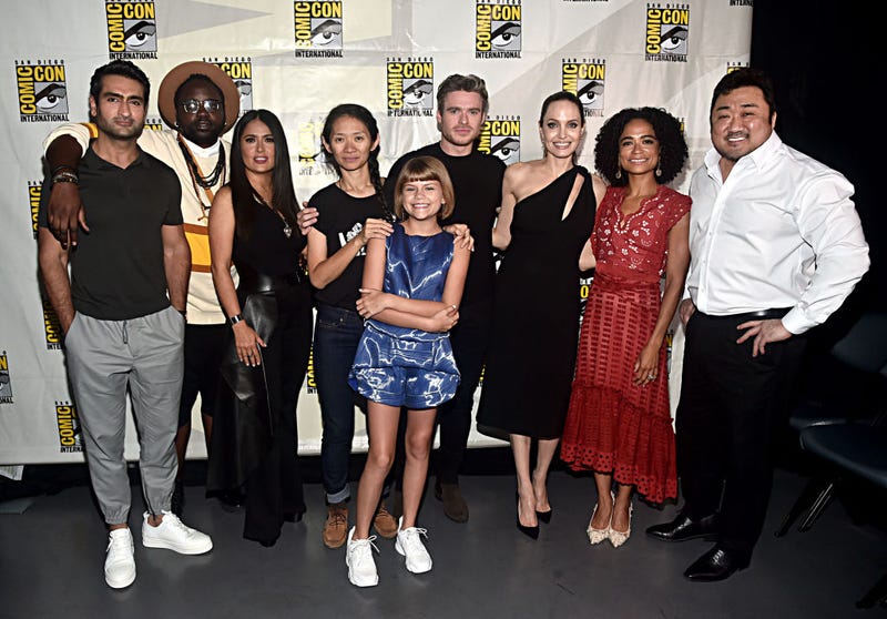 L-R) Kumail Nanjiani, Brian Tyree Henry, Salma Hayek, Director Chloe Zhao, Lia McHugh, Richard Madden, Angelina Jolie, Lauren Ridloff and Don Lee of Marvel Studios' 'The Eternals' at the San Diego Comic-Con International 2019 Marvel Studios Panel in Hall H on July 20, 2019 in San Diego, California.
