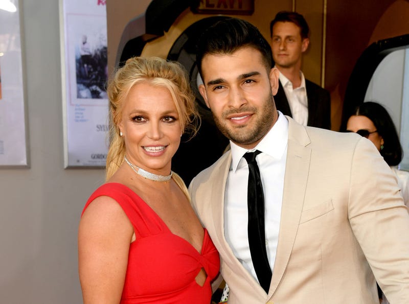 Britney Spears (L) and Sam Asghari arrive at the premiere of Sony Pictures' "One Upon A Time...In Hollywood" at the Chinese Theatre on July 22, 2019 in Hollywood, California.