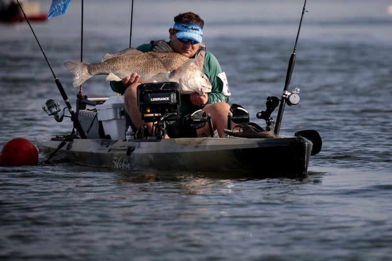 fisherman with fish
