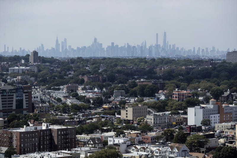 Jamaica, Queens, is seen with the Manhattan skyline in the distance