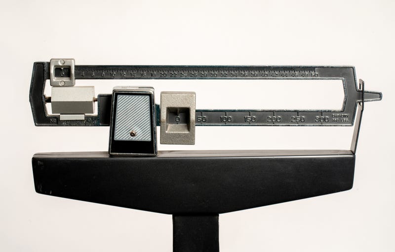Medical Weight Scale isolated on white counterbalance