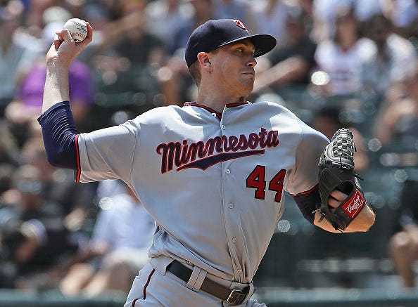 Starting pitcher Kyle Gibson #44 of the Minnesota Twins delivers the ball against the Chicago White Sox at Guaranteed Rate Field on July 28, 2019 in Chicago, Illinois. 