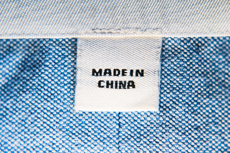 A clothing tag reading "Made in China"