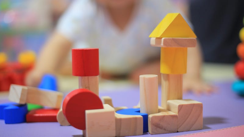 baby playing with blocks