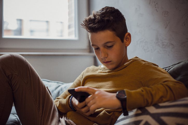 tween using cell phone