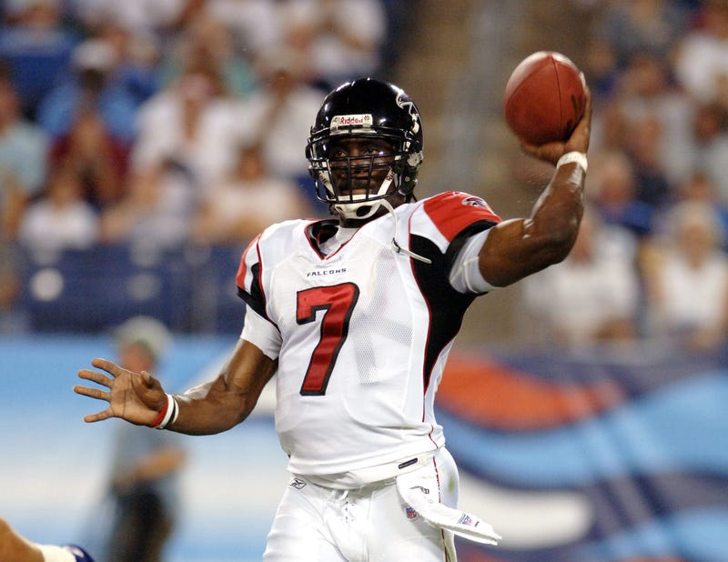 michael vick throws for atlanta falcons