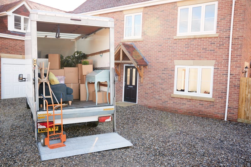 moving truck in front of house