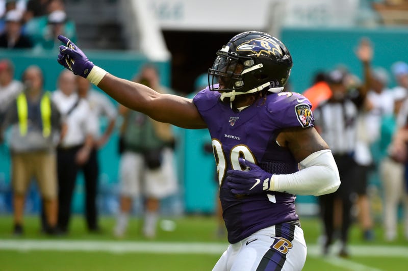 Ravens LB Matt Judon points downfield 
