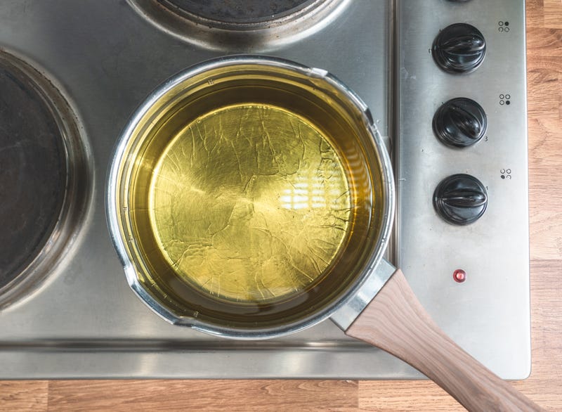cooking oil in a pot on the stove