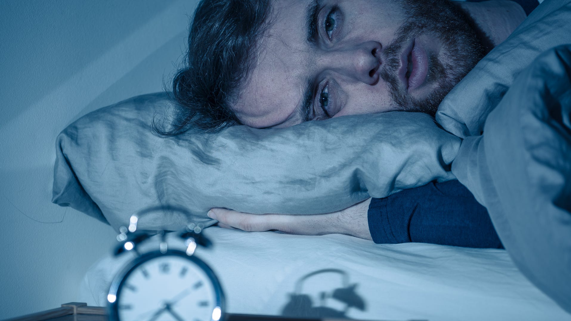 How sleeping with even a little bit of light in the room can harm your health: study