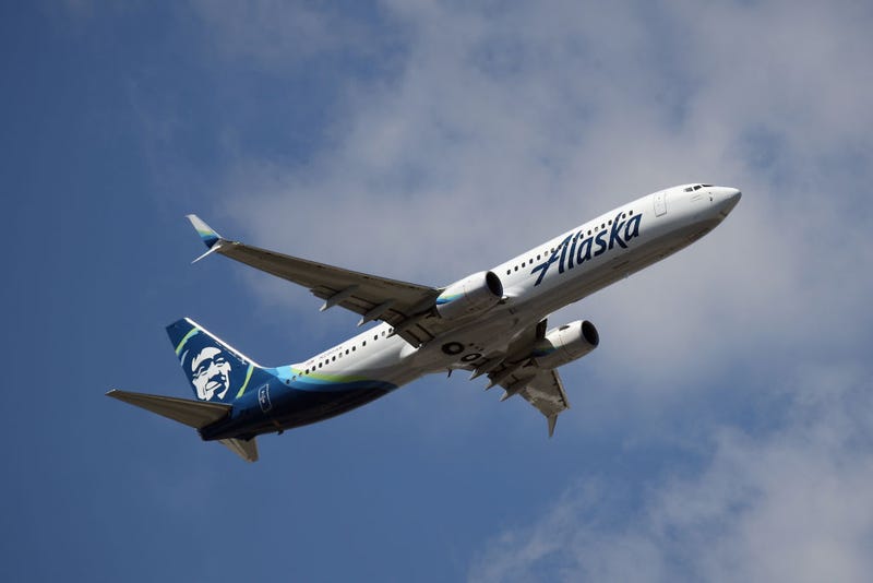 A Boeing 737-990 (ER) operated by Alaska Airlines takes off from JFK Airport on August 24, 2019 in the Queens borough of New York City.