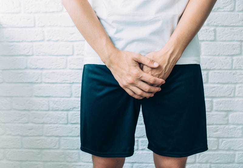 Man holding his hands in front of him stock image.